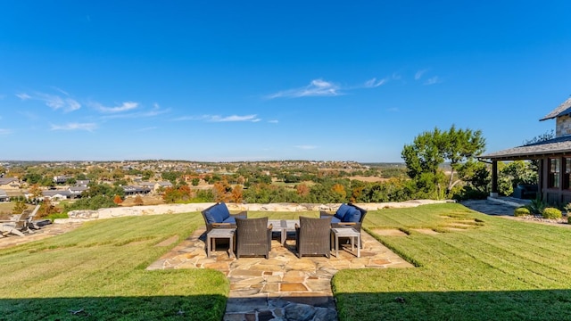 view of yard featuring an outdoor living space and a patio area