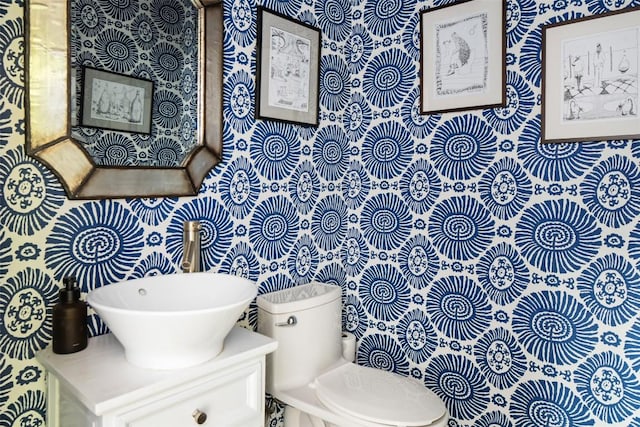 303 W Annie St, Austin, TX 78704 - bathroom featuring wallpapered walls and toilet