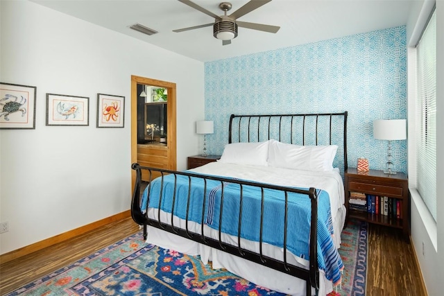 303 W Annie St, Austin, TX 78704 - bedroom featuring wood finished floors, baseboards, and ceiling fan