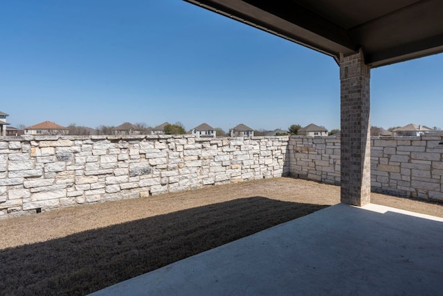 view of yard featuring a fenced backyard and a patio area