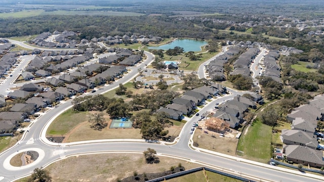 bird's eye view with a water view and a residential view