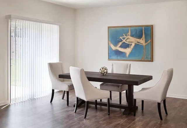 dining room with dark wood-type flooring