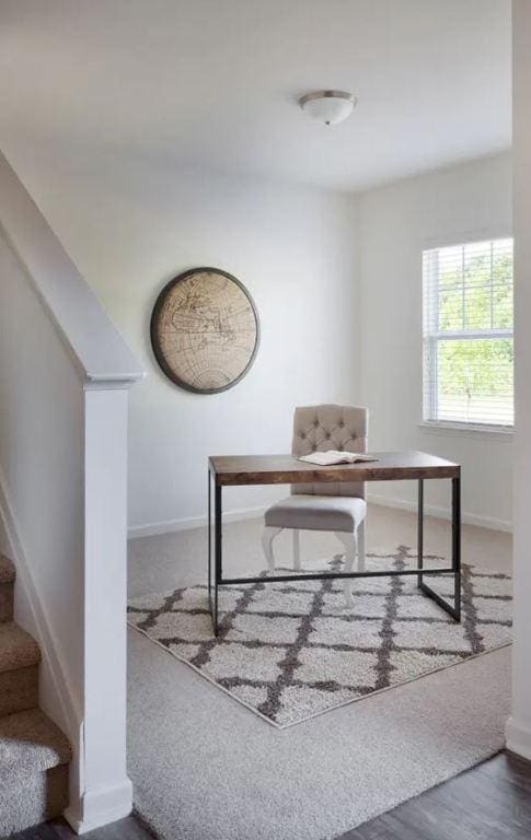 office area featuring wood finished floors and baseboards