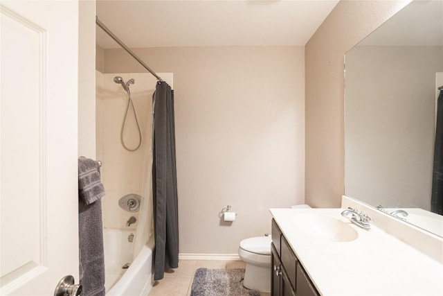 full bathroom featuring vanity, toilet, shower / tub combo, tile patterned floors, and baseboards