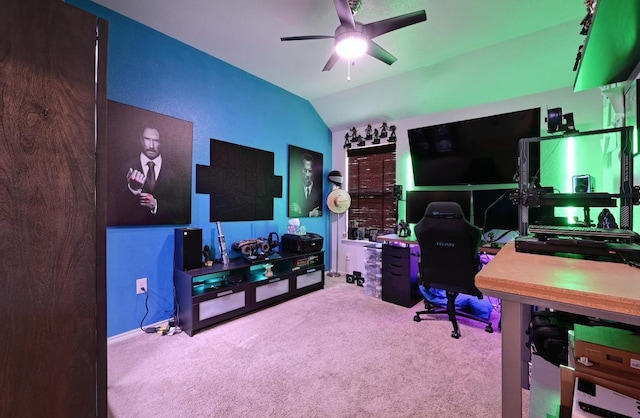 office area with carpet flooring, ceiling fan, and vaulted ceiling