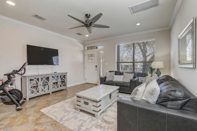 living area with ceiling fan, visible vents, and ornamental molding