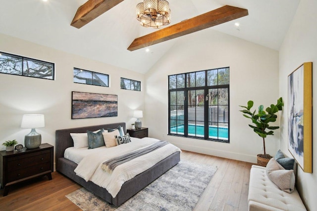 bedroom with beam ceiling, high vaulted ceiling, baseboards, and wood-type flooring