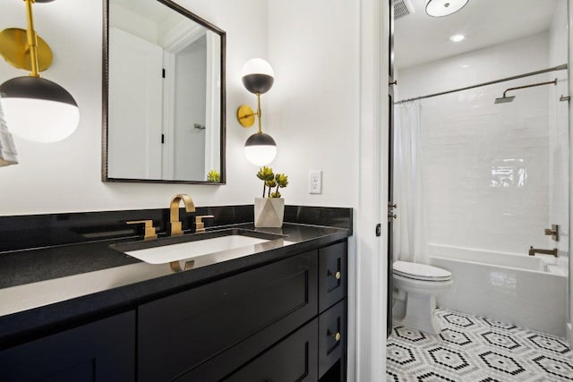 full bath with tile patterned floors, visible vents, toilet, shower / bath combo, and vanity