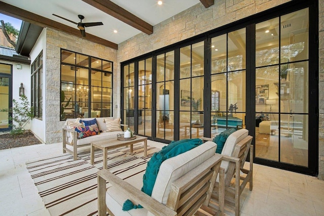 view of patio featuring outdoor lounge area and ceiling fan