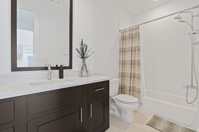 bathroom with toilet, vanity, and shower / tub combo