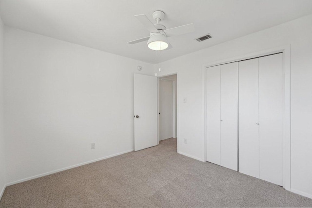 5217 Summerset Trl, Austin, TX 78749 - unfurnished bedroom with light carpet, a closet, and ceiling fan