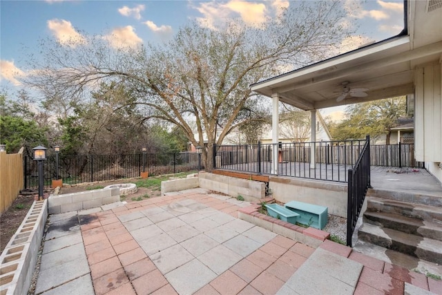 view of patio / terrace featuring a fenced backyard and ceiling fan