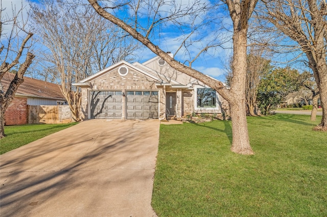 ranch-style home with brick siding, a front lawn, fence, a garage, and driveway