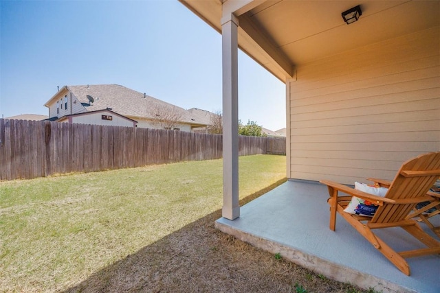 view of yard with a patio and a fenced backyard