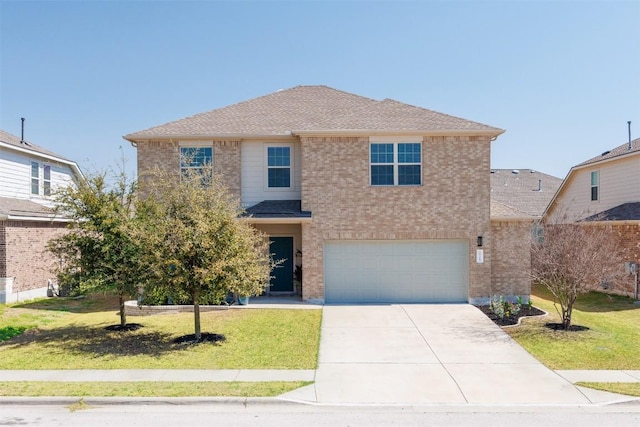 traditional home featuring a front lawn, concrete driveway, and brick siding