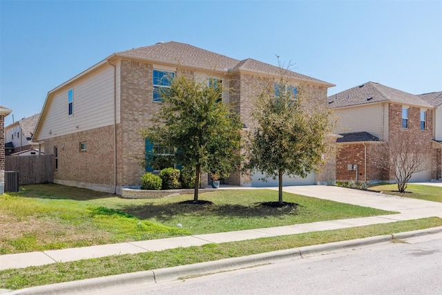 exterior space featuring brick siding, a front lawn, fence, central air condition unit, and concrete driveway