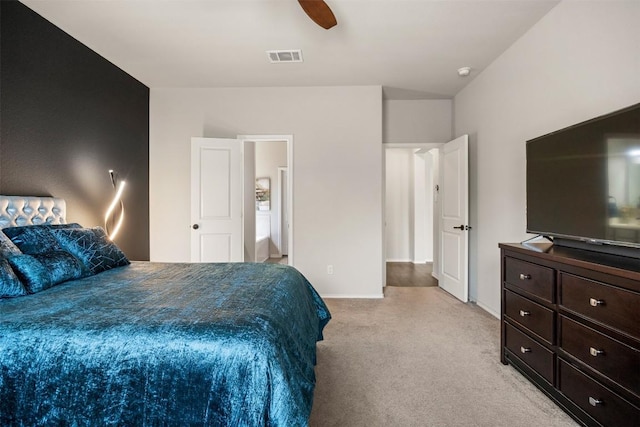 bedroom featuring a ceiling fan, baseboards, visible vents, and light carpet