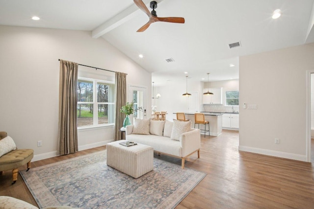 103 Manana Ct, Bastrop, TX 78602 - living room with beamed ceiling, light wood-style flooring, ceiling fan, recessed lighting, and high vaulted ceiling