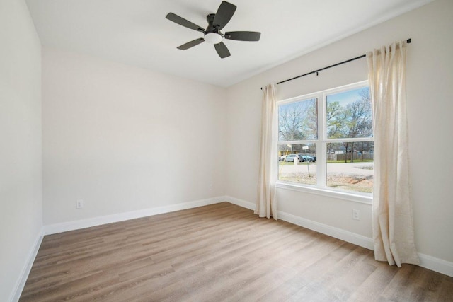 103 Manana Ct, Bastrop, TX 78602 - unfurnished room featuring light wood-style floors and ceiling fan