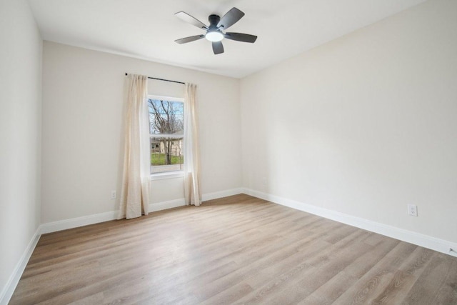 103 Manana Ct, Bastrop, TX 78602 - spare room with wood finished floors and a ceiling fan