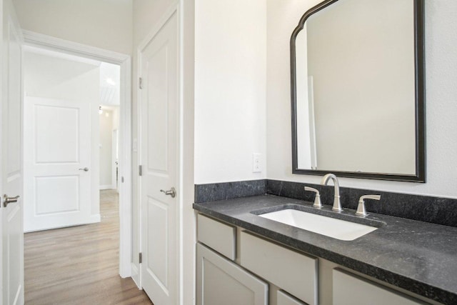 103 Manana Ct, Bastrop, TX 78602 - bathroom with vanity and wood finished floors