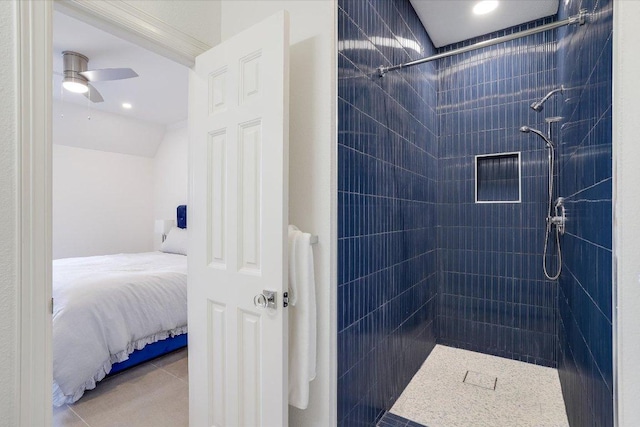 bathroom featuring tile patterned floors, ensuite bathroom, a tile shower, and ceiling fan