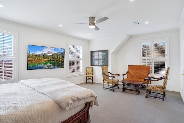 bedroom with recessed lighting, multiple windows, and ornamental molding