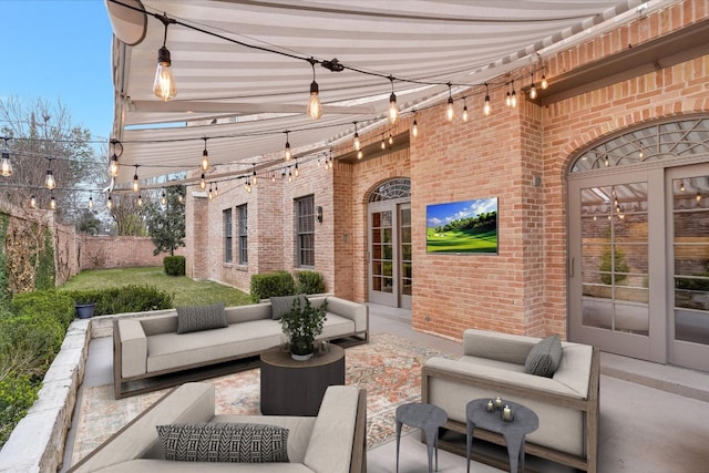 view of patio with french doors, an outdoor hangout area, and fence