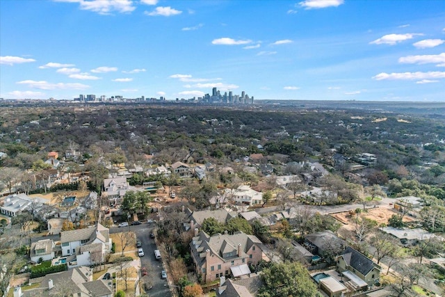 birds eye view of property featuring a view of city