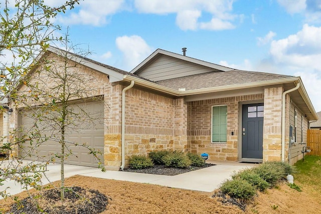 single story home featuring a garage, stone siding, concrete driveway, and a shingled roof