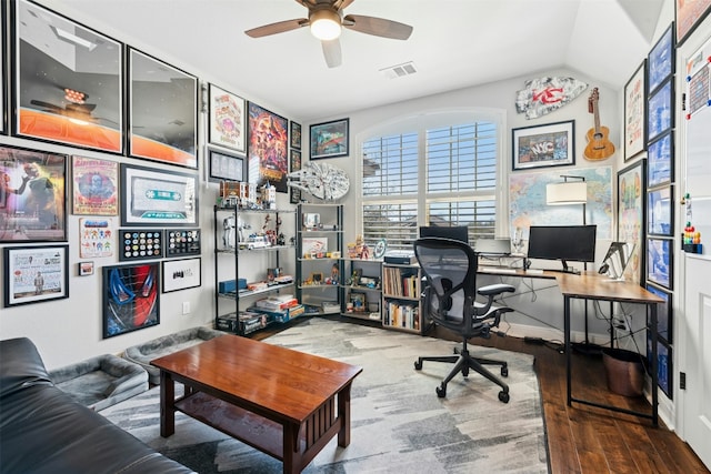 office space featuring visible vents, a ceiling fan, lofted ceiling, and wood finished floors