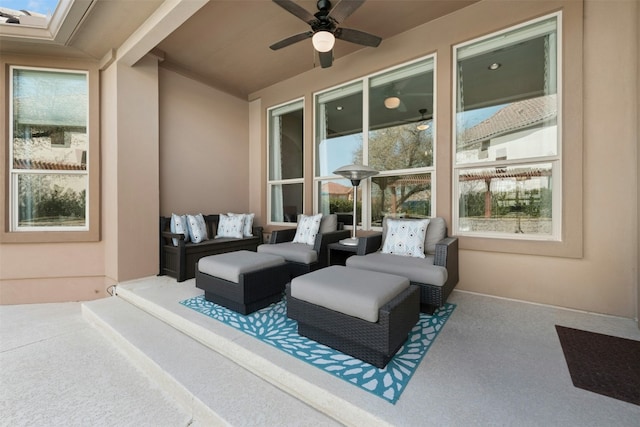 view of patio featuring outdoor lounge area and ceiling fan