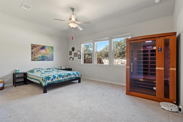 bedroom featuring a sauna, visible vents, baseboards, and carpet flooring