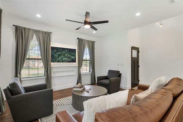 living room featuring recessed lighting, baseboards, wood finished floors, and ceiling fan