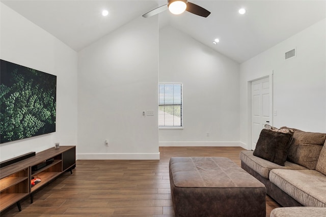 living room with visible vents, high vaulted ceiling, a ceiling fan, wood finished floors, and baseboards