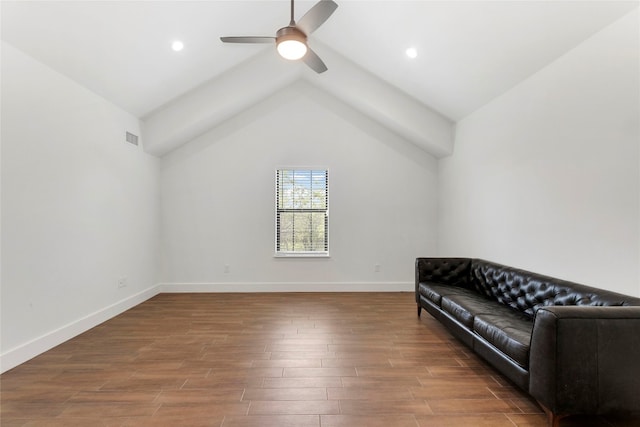 interior space featuring visible vents, baseboards, wood finished floors, and a ceiling fan