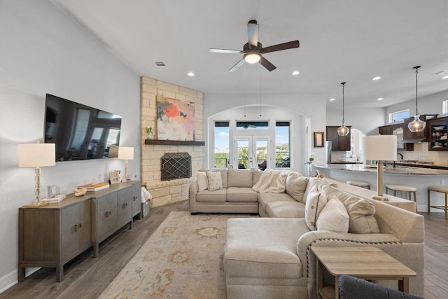 living room featuring recessed lighting, french doors, wood finished floors, and ceiling fan