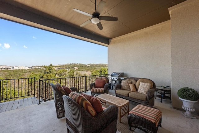 view of patio / terrace with an outdoor living space, a balcony, area for grilling, and ceiling fan