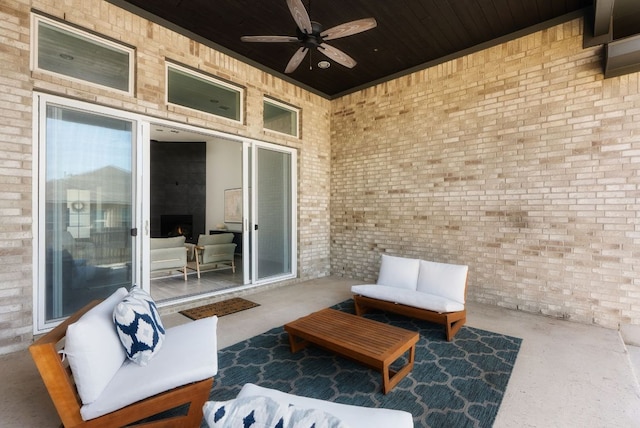 view of patio with an outdoor hangout area and a ceiling fan