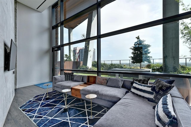 70 Rainey St Unit 1807, Austin, TX 78701 - living area with wood finished floors and baseboards