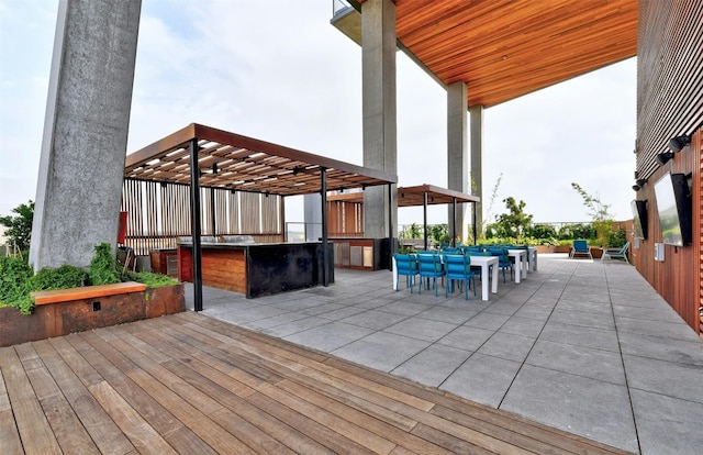 70 Rainey St Unit 1807, Austin, TX 78701 - wooden deck with exterior bar