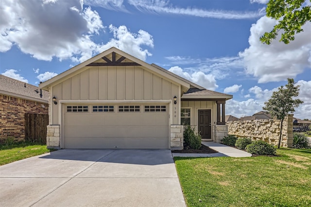 view of front of property featuring a front lawn, stone siding, board and batten siding, concrete driveway, and a garage