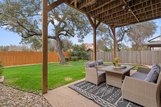 view of patio featuring outdoor lounge area and a fenced backyard