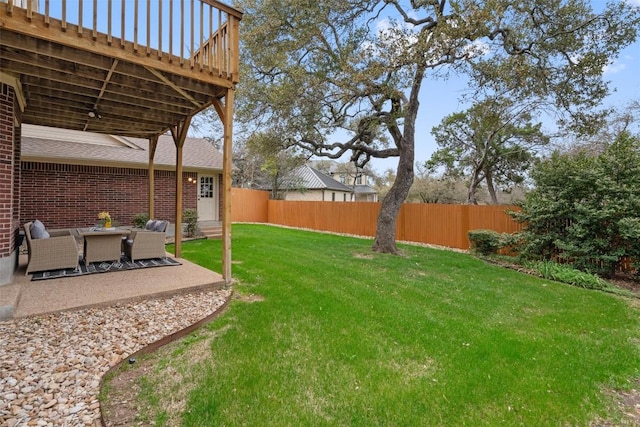 view of yard with a patio and a fenced backyard