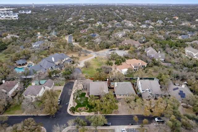 birds eye view of property with a residential view