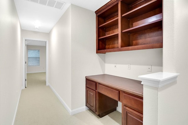 6717 Blissfield Dr, Austin, TX 78739 - unfurnished office with built in desk and light colored carpet