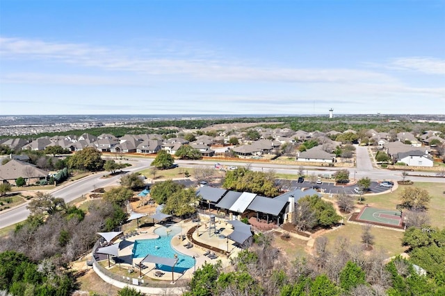 birds eye view of property with a residential view