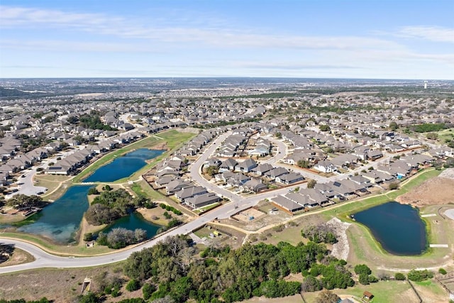 aerial view featuring a residential view and a water view