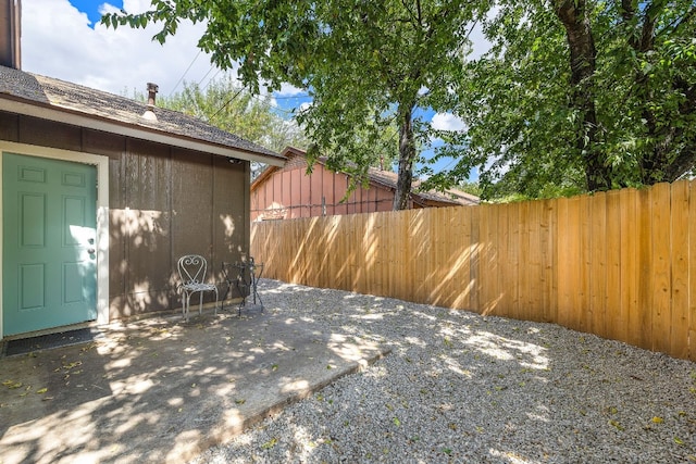 view of patio with fence