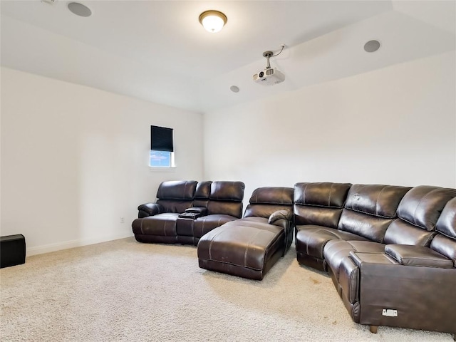 cinema room with carpet and baseboards